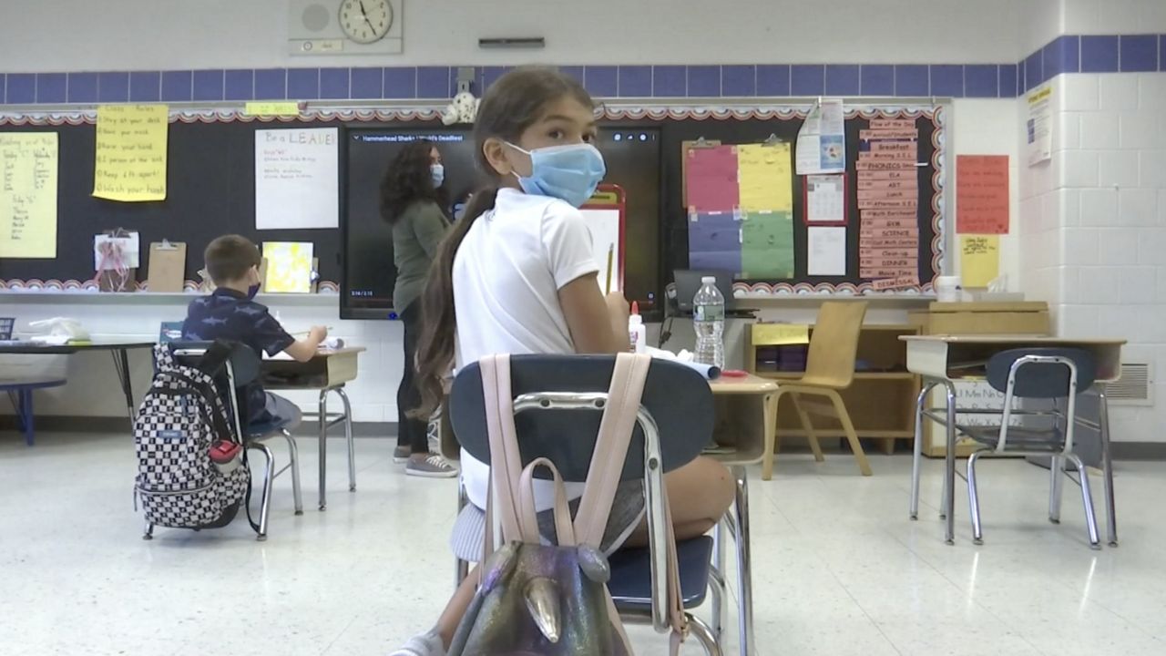 The website for schools to report coronavirus cases went live Monday
